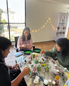 Arts and crafts workshop with participants at a table, Baner, Pune